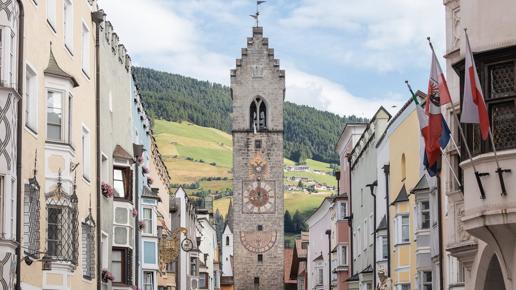 The perfect location for your apartment in Sterzing View of the Zwölferturm tower among colorful buildings in Sterzing, South Tyrol